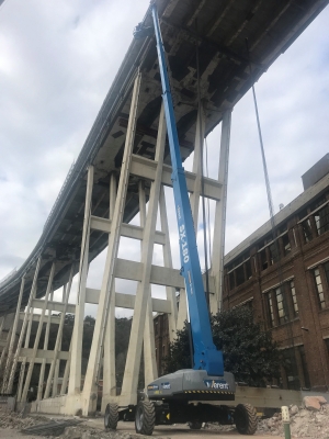 Genie SX-180 telescopic boom lifts, stabilising Morandi Bridge